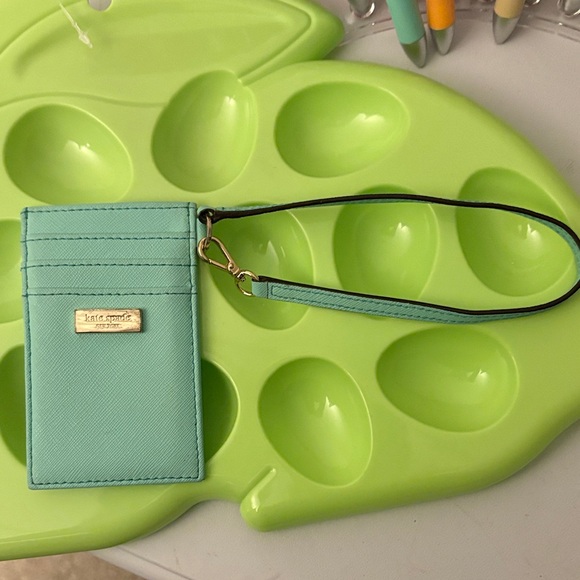 kate spade Handbags - Kate Spade Aqua Card Holder with Black Strap